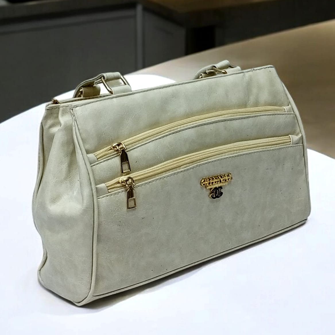 7 zipper Handbag